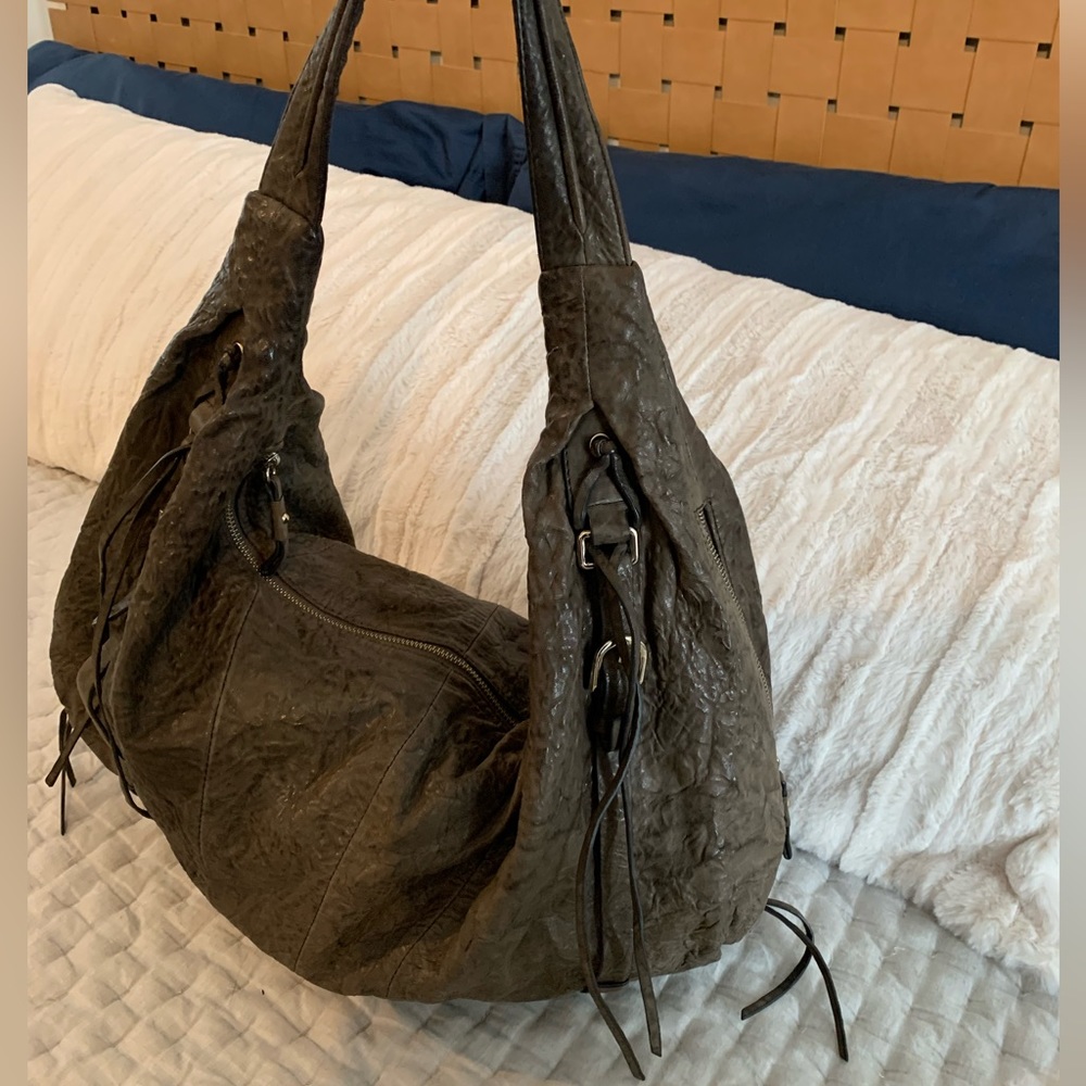 Genuine leather hobo bag with tassels, hardware and a rock n’ roll vibe